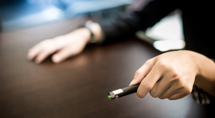 Holding a laser pointer