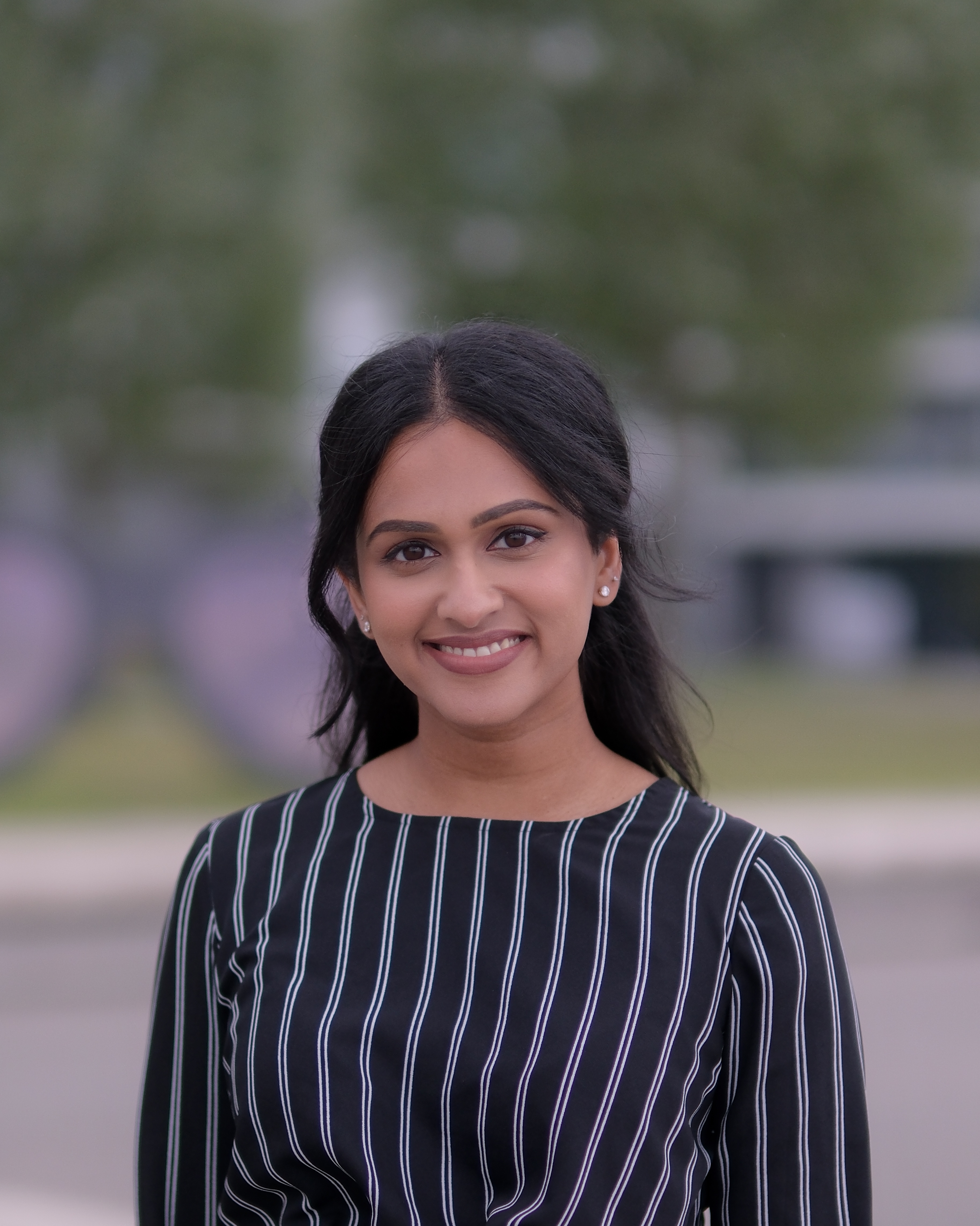 Headshot of Thaksha Sritharan