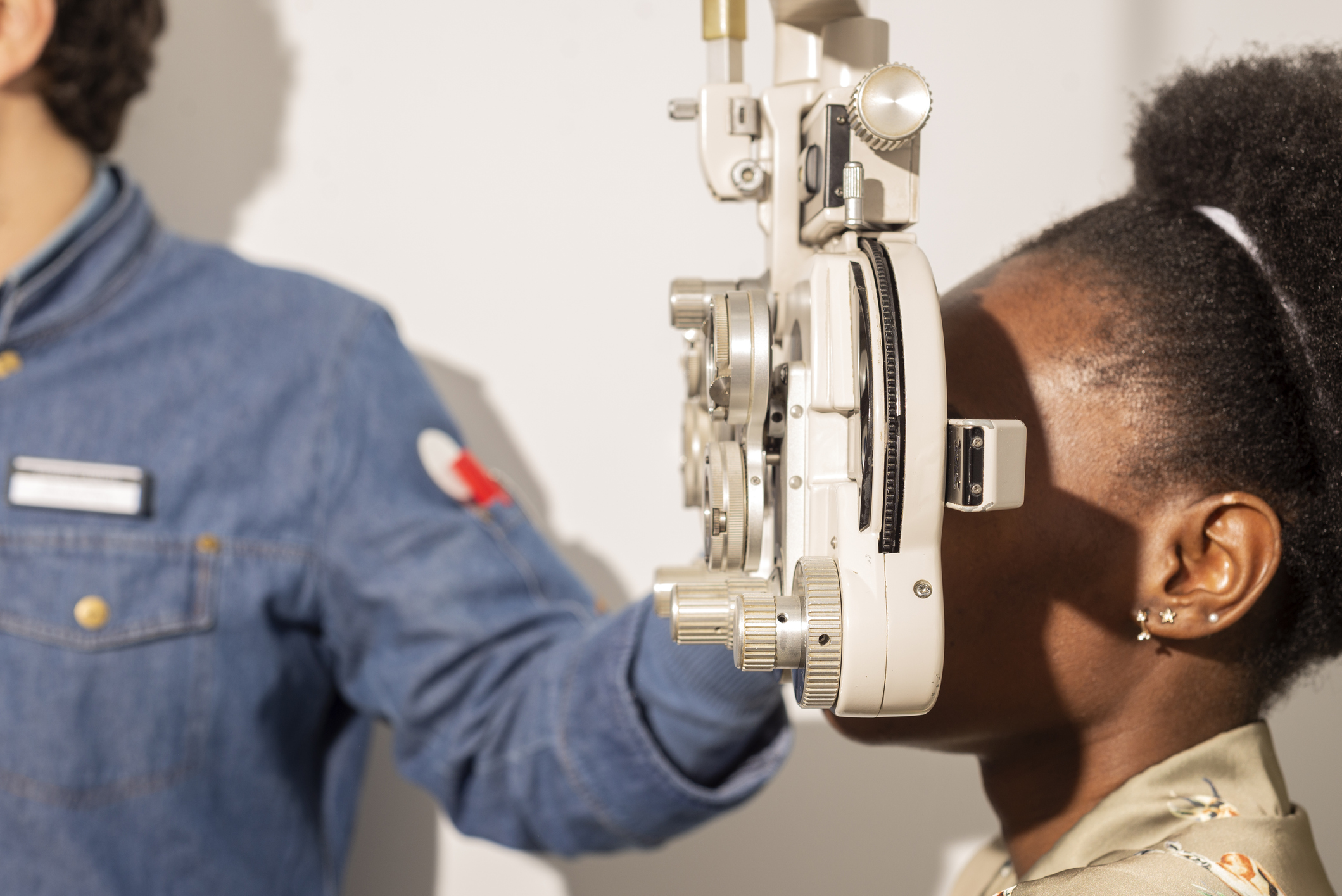 Young woman doing eye test