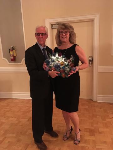 CAO President Dr. Mike Dennis presents Vision Champion Award to Linda Lemon