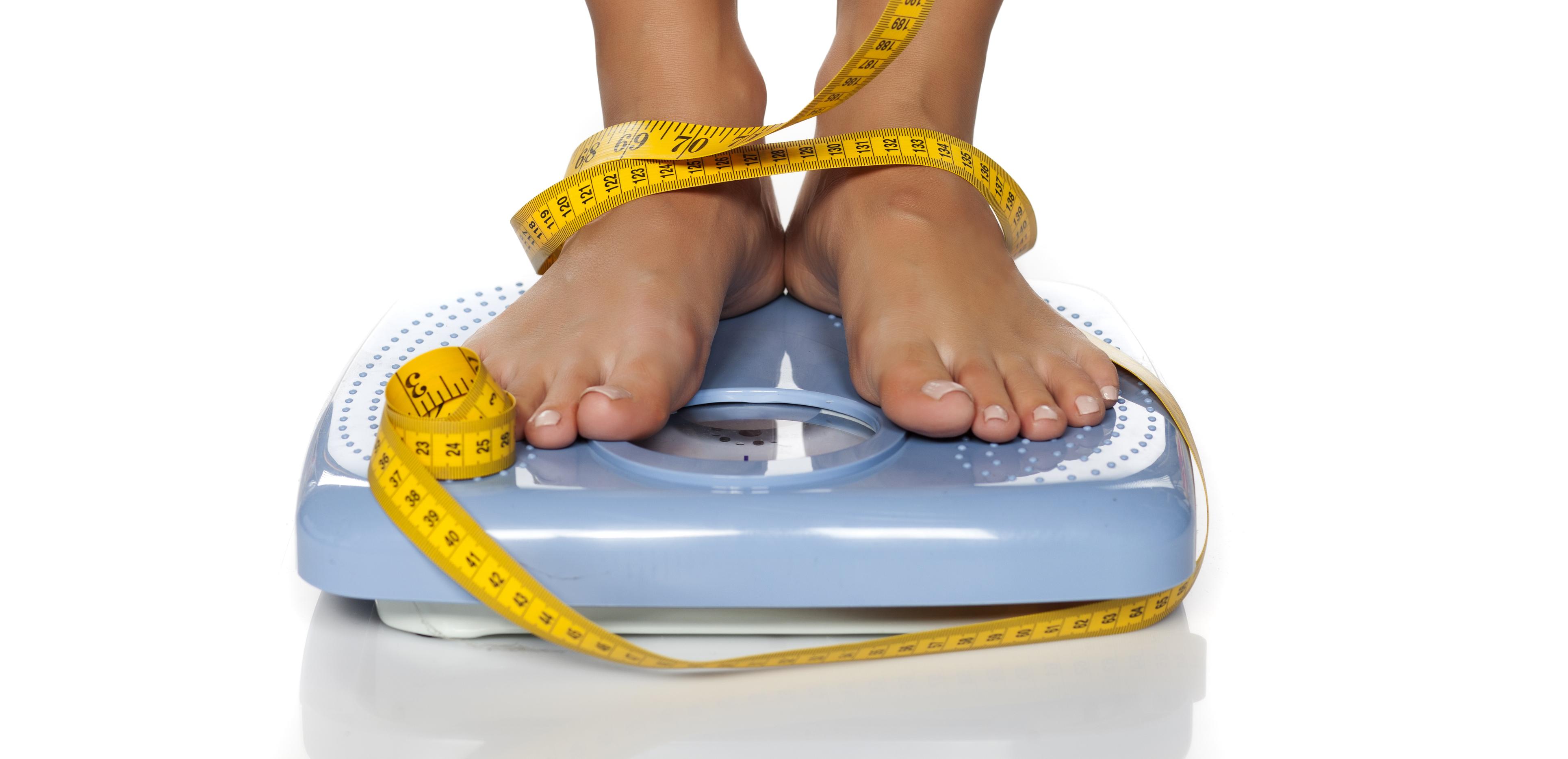 Person over a weighing machine