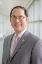 Headshot image of Dr. Stanley Woo